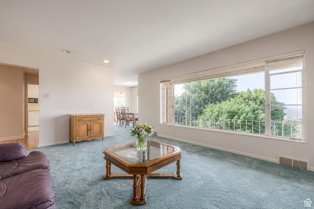 420 E 12th Ave, Salt Lake City, UT 84103 - carpeted living area with baseboards and recessed lighting
