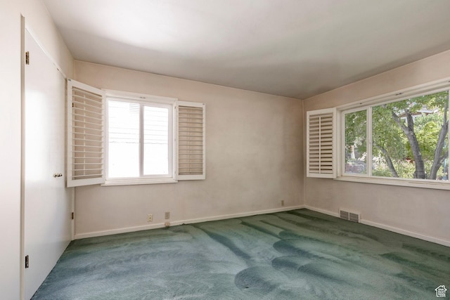 420 E 12th Ave, Salt Lake City, UT 84103 - empty room featuring carpet floors and baseboards