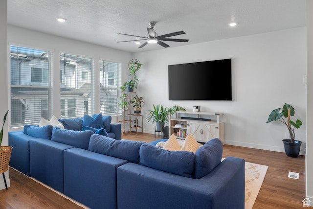937 W Terracotta Dr, Saratoga Springs, UT 84045 - living area featuring ceiling fan, wood finished floors, a textured ceiling, and recessed lighting
