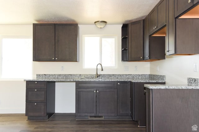 327 N 600 W, Grantsville, UT 84029 - kitchen with healthy amount of natural light, dark wood-type flooring, and dark brown cabinetry