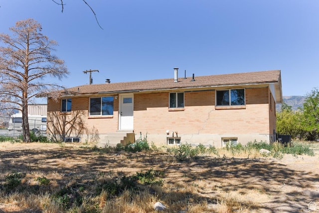 327 N 600 W, Grantsville, UT 84029 - view of front of house featuring entry steps and brick siding