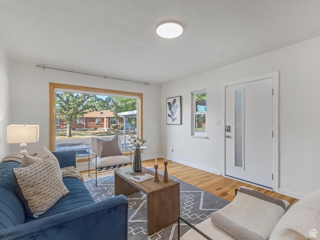 1406 W Talisman Dr, Salt Lake City, UT 84116 - living area with wood finished floors and baseboards