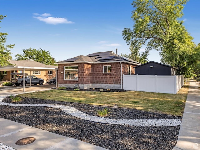 1406 W Talisman Dr, Salt Lake City, UT 84116 - view of front of property with brick siding and roof mounted solar panels