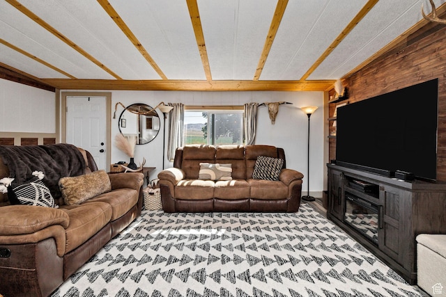 20105 N 5000 W, Plymouth, UT 84330 - living room with wooden walls and beam ceiling