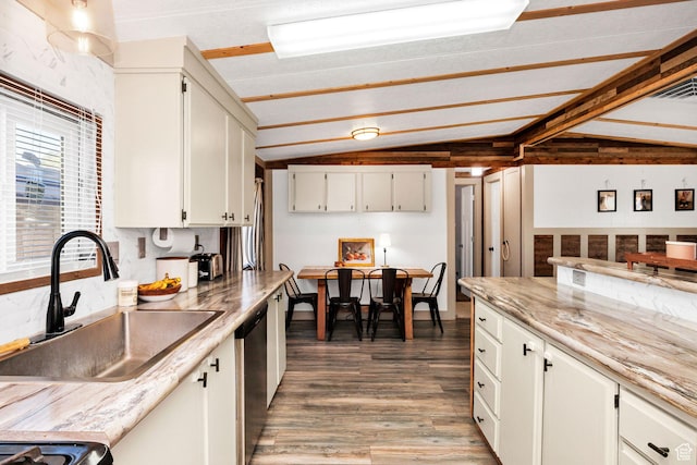 20105 N 5000 W, Plymouth, UT 84330 - kitchen featuring vaulted ceiling, white cabinetry, light wood-style floors, light countertops, and dishwasher