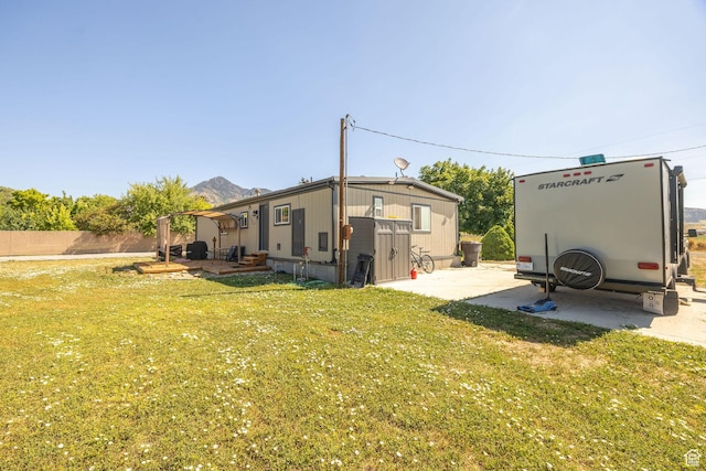 20105 N 5000 W, Plymouth, UT 84330 - rear view of house with a patio area