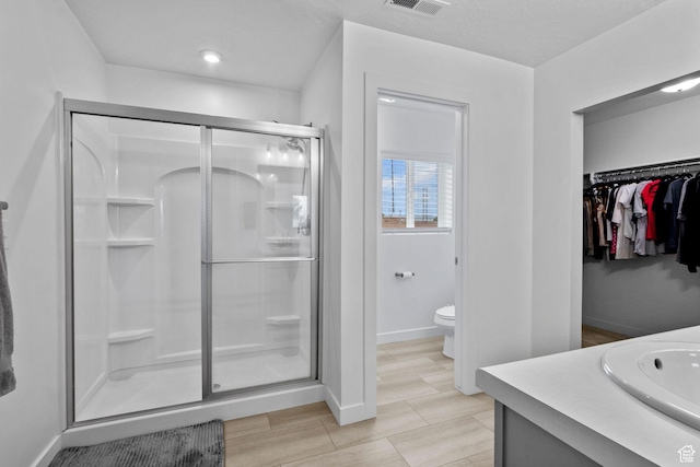 1162 W 1100 S, Clearfield, UT 84015 - bathroom with a shower stall, vanity, and a spacious closet