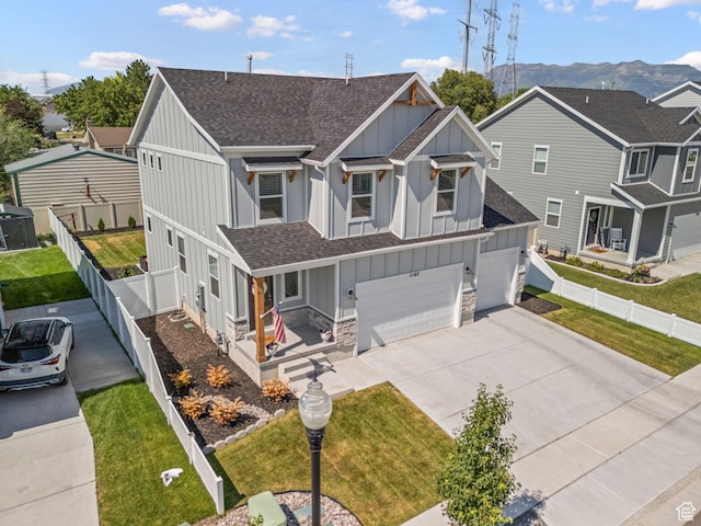 1162 W 1100 S, Clearfield, UT 84015 - view of front of property with board and batten siding, roof with shingles, a garage, and driveway