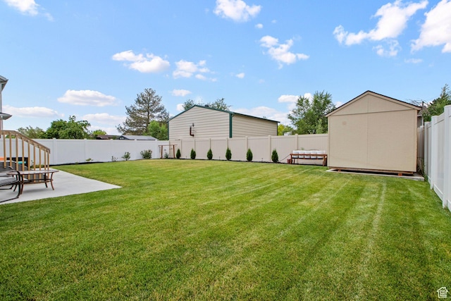 1162 W 1100 S, Clearfield, UT 84015 - fenced backyard with a storage shed and a patio