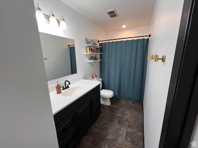 695 N Orange Ct, Castle Dale, UT 84513 - full bath with vanity, a shower with curtain, and stone finish floors