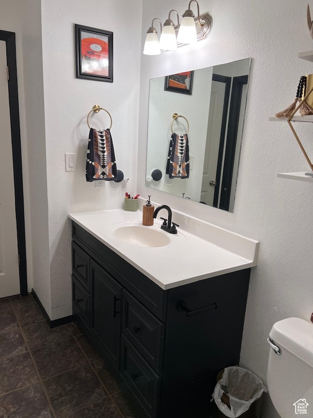 695 N Orange Ct, Castle Dale, UT 84513 - half bath featuring vanity and tile patterned floors
