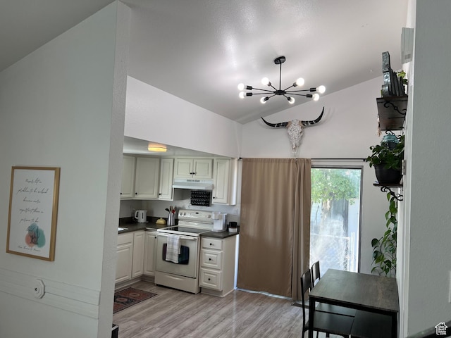 695 N Orange Ct, Castle Dale, UT 84513 - kitchen featuring electric stove, under cabinet range hood, a chandelier, dark countertops, and light wood-type flooring