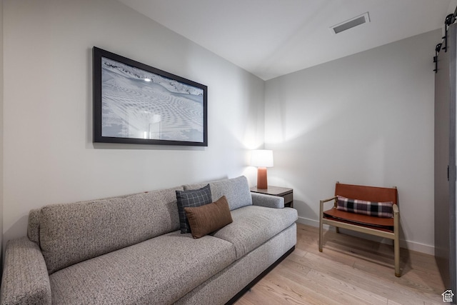2417 W High Mountain Rd Unit 2416, Park City, UT 84098 - living room with a barn door and light wood-type flooring
