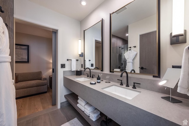2417 W High Mountain Rd Unit 2416, Park City, UT 84098 - full bath with double vanity, wood finished floors, a tile shower, and recessed lighting