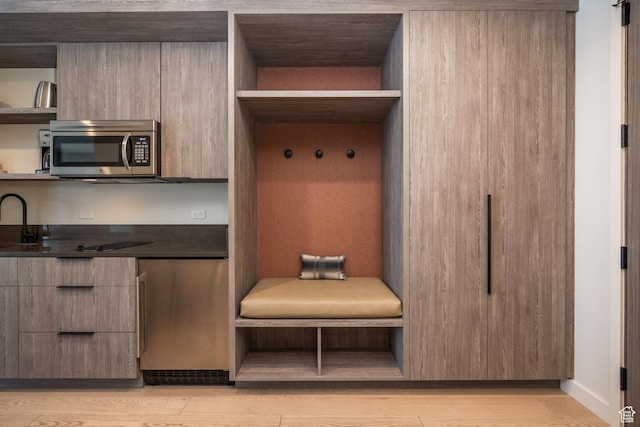 2417 W High Mountain Rd Unit 2416, Park City, UT 84098 - mudroom featuring light wood-type flooring and a sink