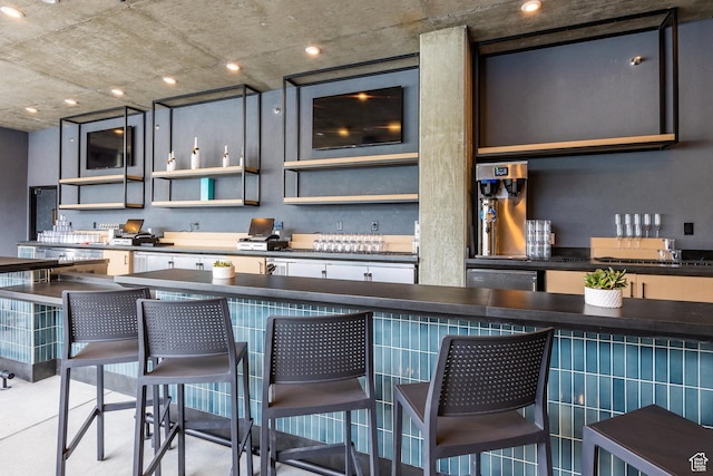 2417 W High Mountain Rd Unit 2416, Park City, UT 84098 - kitchen with dark countertops, open shelves, a breakfast bar, and glass insert cabinets