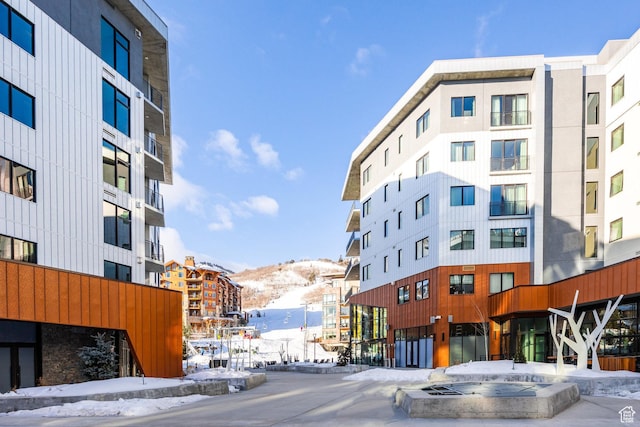 2417 W High Mountain Rd Unit 2416, Park City, UT 84098 - snow covered building featuring a view of apartment building / complex and a mountain view