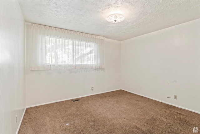 7738 S 2700 W, West Jordan, UT 84084 - carpeted spare room with a textured ceiling and baseboards