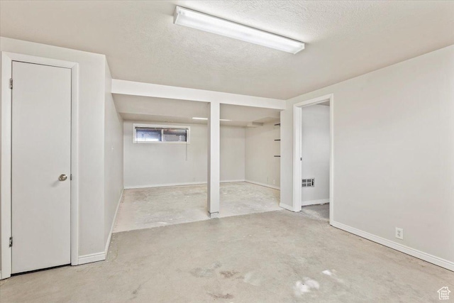 7738 S 2700 W, West Jordan, UT 84084 - unfurnished bedroom with concrete floors, multiple closets, and a textured ceiling