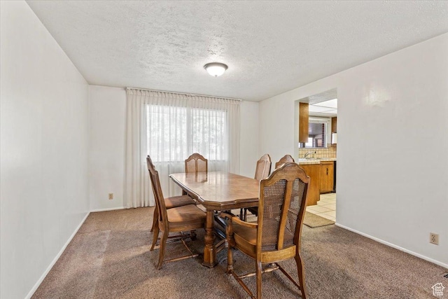 7738 S 2700 W, West Jordan, UT 84084 - dining space with carpet floors and a textured ceiling
