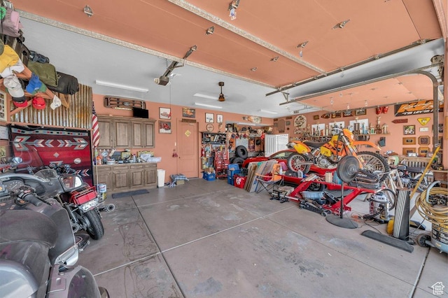 38 W 1725 S, Washington, UT 84780 - garage with a workshop area and a garage door opener