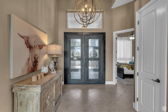 38 W 1725 S, Washington, UT 84780 - foyer with french doors, light tile patterned floors, and a chandelier