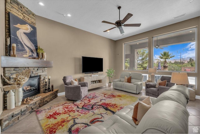 38 W 1725 S, Washington, UT 84780 - tiled living area with ceiling fan, a fireplace, and recessed lighting