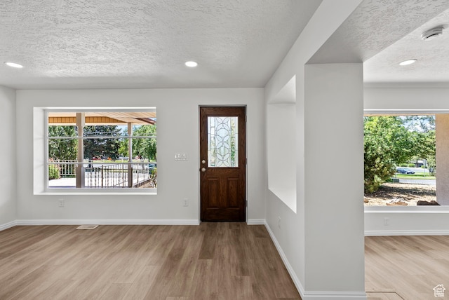 1175 E 900 N, Lehi, UT 84043 - foyer featuring a textured ceiling, wood finished floors, and recessed lighting