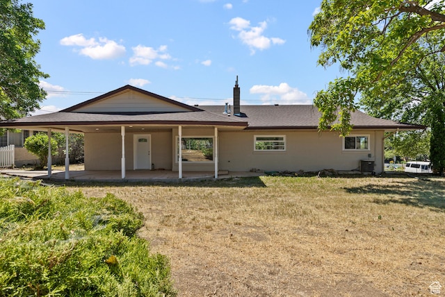 1175 E 900 N, Lehi, UT 84043 - rear view of house featuring a patio, a yard, a carport, roof with shingles, and stucco siding