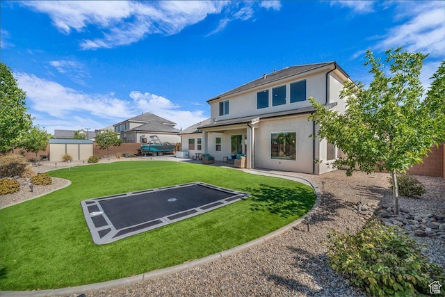 2249 E Fieldstone Cir, St George, UT 84790 - rear view of house featuring stucco siding, an outdoor living space, a patio area, and a fenced backyard
