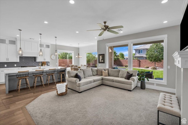 2249 E Fieldstone Cir, St George, UT 84790 - living room with recessed lighting, wood finished floors, and a ceiling fan