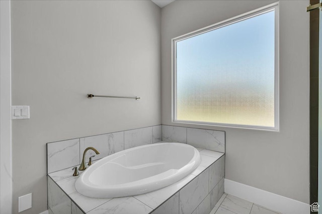 2249 E Fieldstone Cir, St George, UT 84790 - full bath with a garden tub, plenty of natural light, and marble look tile flooring
