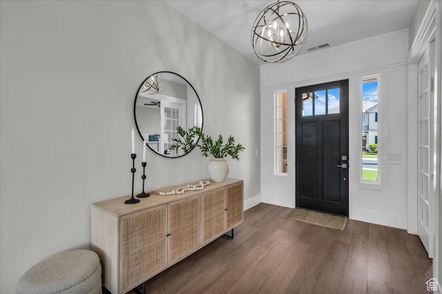 2249 E Fieldstone Cir, St George, UT 84790 - entryway featuring dark wood-type flooring, a chandelier, and ornamental molding