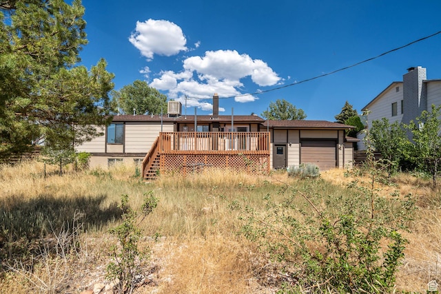 564 S 940 W, Cedar City, UT 84720 - rear view of property featuring a deck and a garage