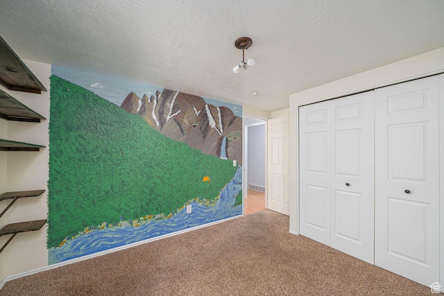 564 S 940 W, Cedar City, UT 84720 - bedroom with carpet, a textured ceiling, and a closet