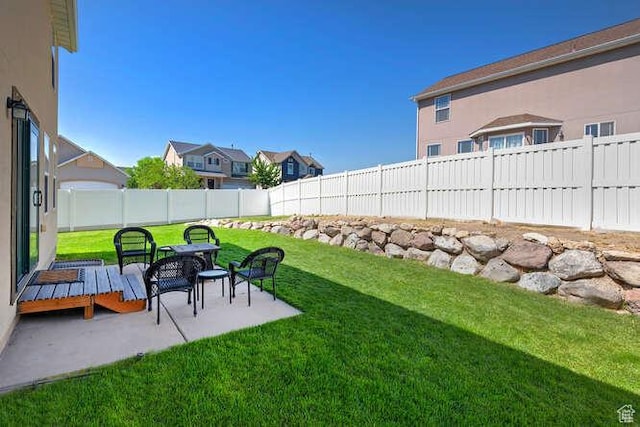 7526 S Park Maple Dr, West Jordan, UT 84081 - fenced backyard with a patio