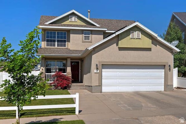 7526 S Park Maple Dr, West Jordan, UT 84081 - view of front of property with driveway, stucco siding, covered porch, and a shingled roof