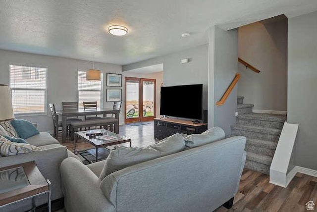 7526 S Park Maple Dr, West Jordan, UT 84081 - living room with stairs, wood finished floors, and french doors