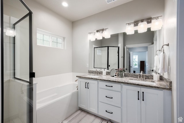 5149 N Edgewood Dr, Provo, UT 84604 - full bath featuring a stall shower, a bath, double vanity, and recessed lighting
