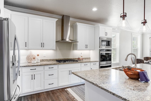5149 N Edgewood Dr, Provo, UT 84604 - kitchen with appliances with stainless steel finishes, wall chimney range hood, dark wood-type flooring, white cabinetry, and light stone countertops