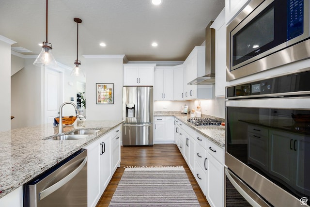 5149 N Edgewood Dr, Provo, UT 84604 - kitchen featuring appliances with stainless steel finishes, wall chimney range hood, dark wood-style flooring, recessed lighting, and light stone countertops