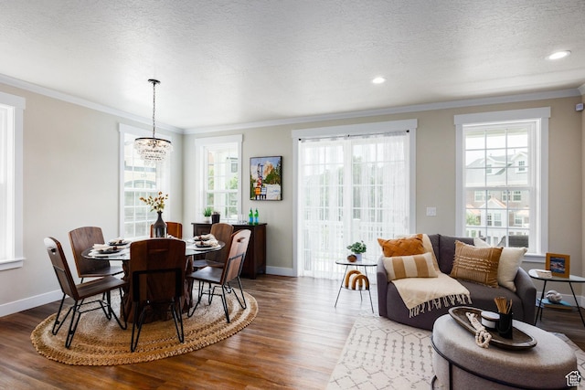 5149 N Edgewood Dr, Provo, UT 84604 - dining area with a chandelier, wood finished floors, ornamental molding, plenty of natural light, and a textured ceiling