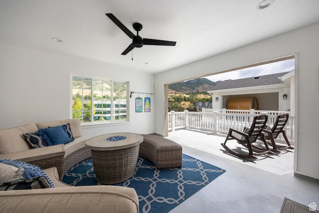 5149 N Edgewood Dr, Provo, UT 84604 - carpeted living room featuring ceiling fan and a mountain view