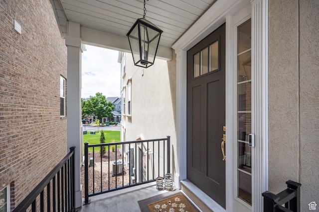 5149 N Edgewood Dr, Provo, UT 84604 - view of exterior entry featuring a porch and stucco siding