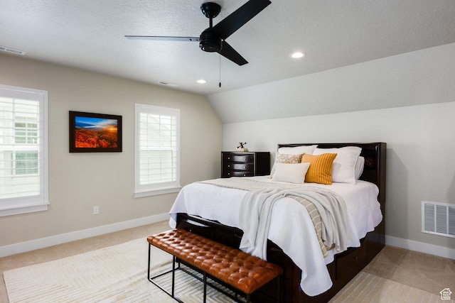 5149 N Edgewood Dr, Provo, UT 84604 - bedroom with light colored carpet, recessed lighting, ceiling fan, vaulted ceiling, and a textured ceiling