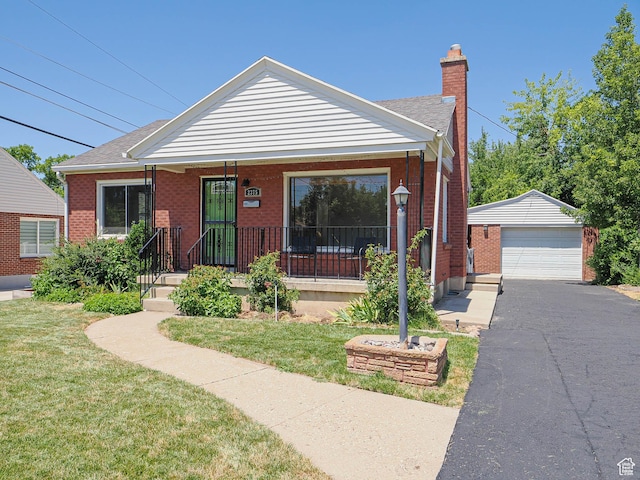 2375 E Redondo Ave, Salt Lake City, UT 84108 - bungalow-style house featuring an outdoor structure, a front lawn, a chimney, and brick siding