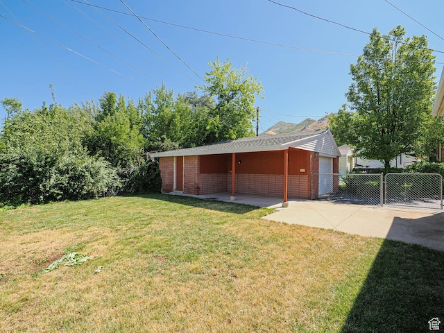 2375 E Redondo Ave, Salt Lake City, UT 84108 - view of yard featuring a garage and an outdoor structure