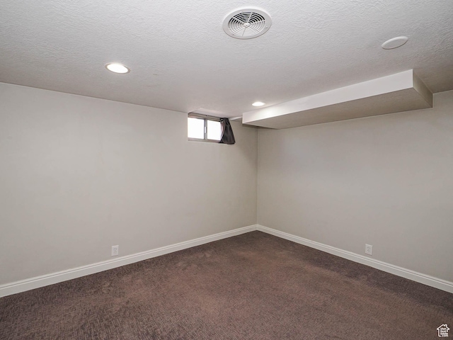 2375 E Redondo Ave, Salt Lake City, UT 84108 - below grade area featuring recessed lighting, dark carpet, and a textured ceiling