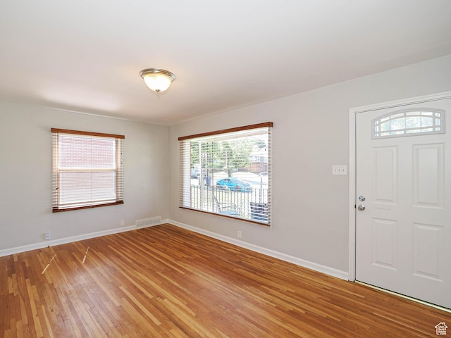 2375 E Redondo Ave, Salt Lake City, UT 84108 - foyer entrance with light wood-style floors and baseboards