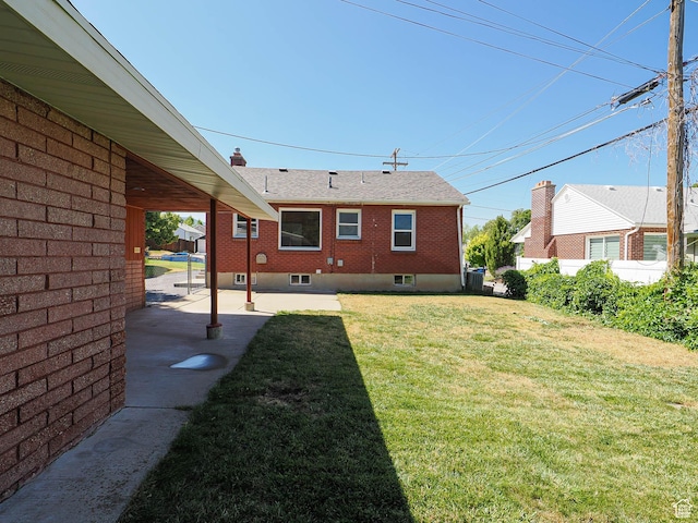 2375 E Redondo Ave, Salt Lake City, UT 84108 - view of green lawn with a patio area